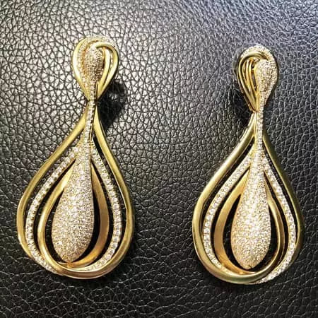 Women's gold and diamond earrings