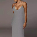 Long sleeveless fitted dress