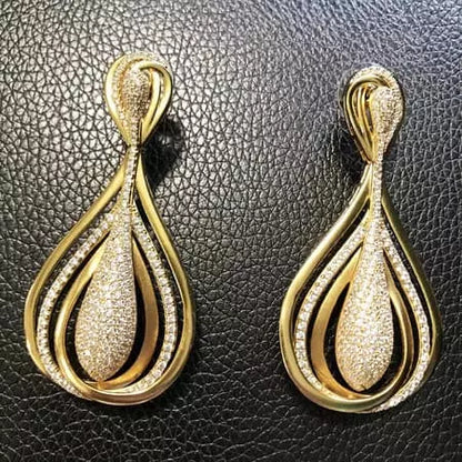 Women's gold and diamond earrings
